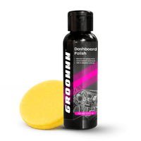 Groomm Dashboard Polish bottle with a yellow polishing pad on a white background